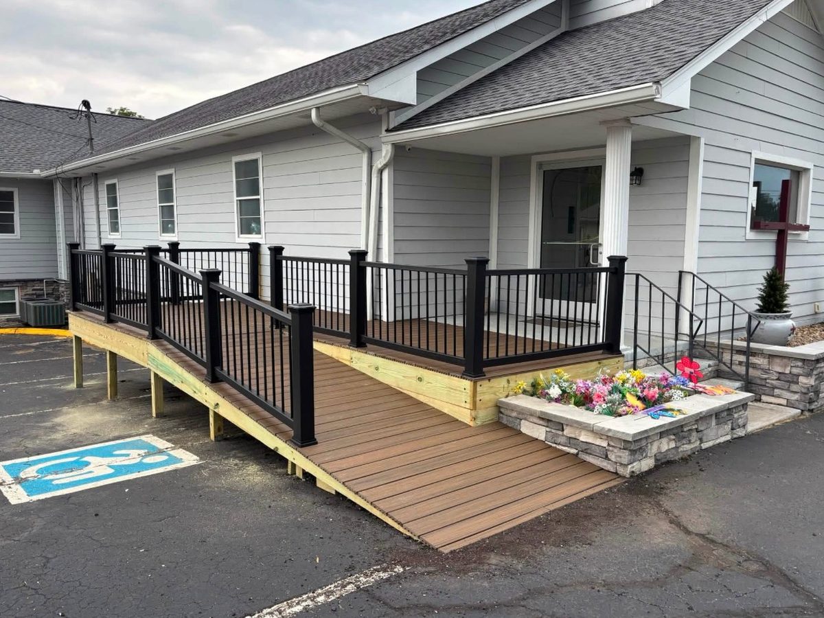 After: new composite ramp and deck with black railings